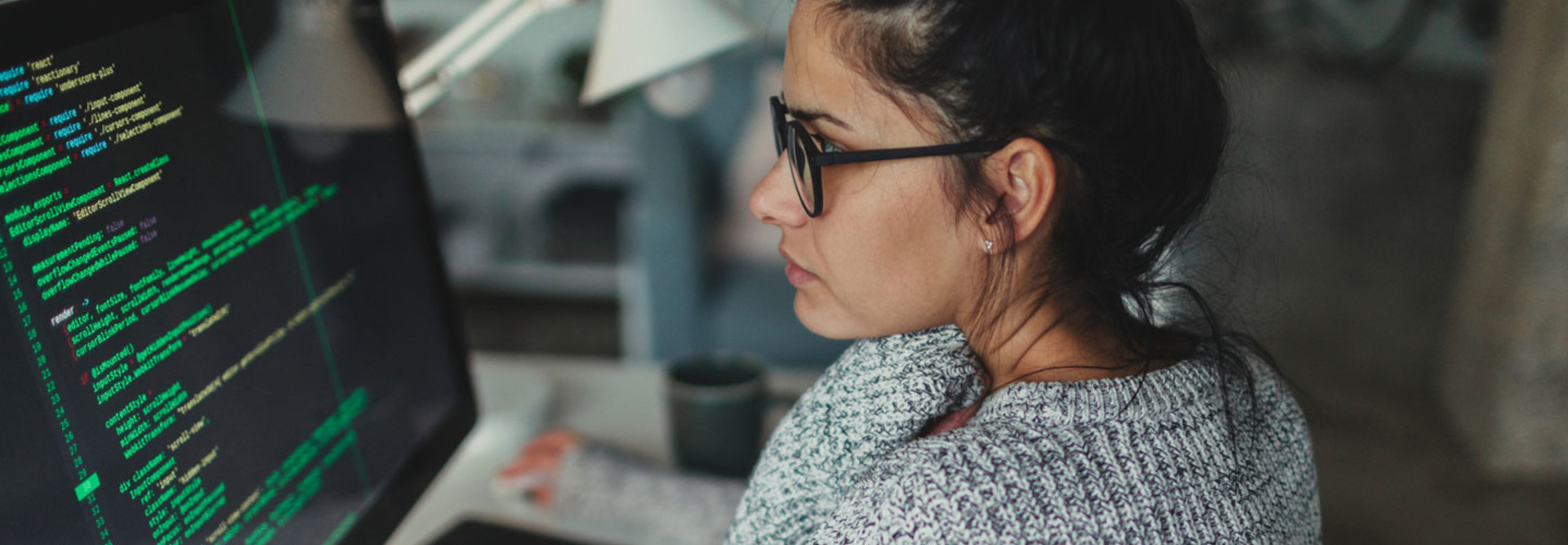 Millennial woman working at a computer