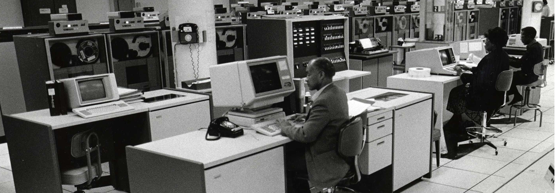 Census Bureau workers in the 1980s on cpmputers 