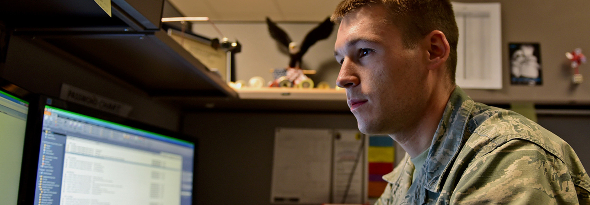 Staff Sgt. Chris Meyer, a 28th Contracting Squadron contract administrator, reviews paperwork at Ellsworth Air Force Base, S.D., Nov. 4, 2015.