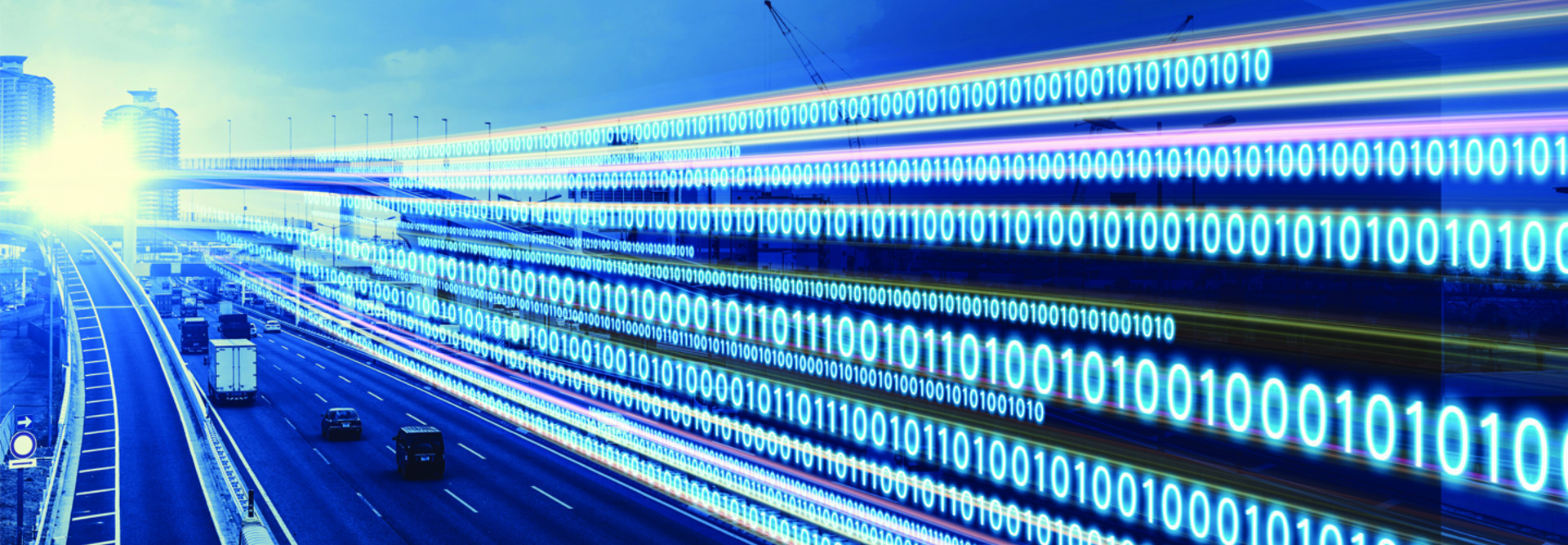 traffic on a highway with binary code along the side of the road