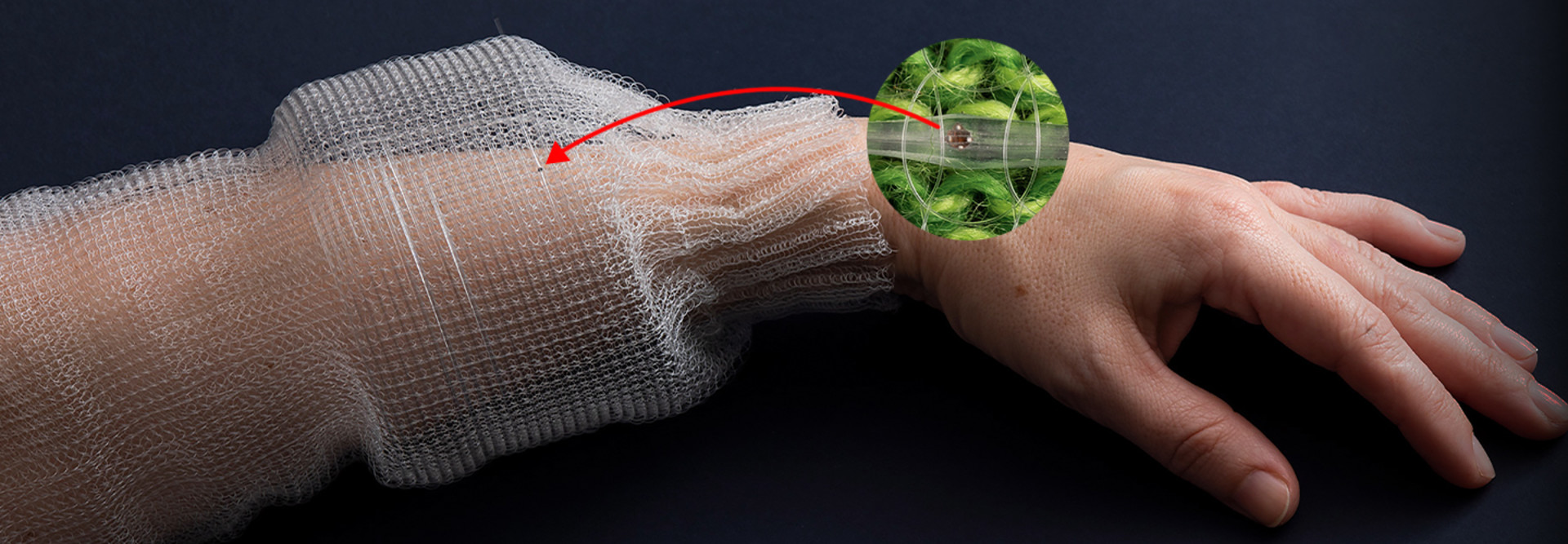 Chips inside a thin fiber can monitor vital signs when the fiber is sewn into cloth.