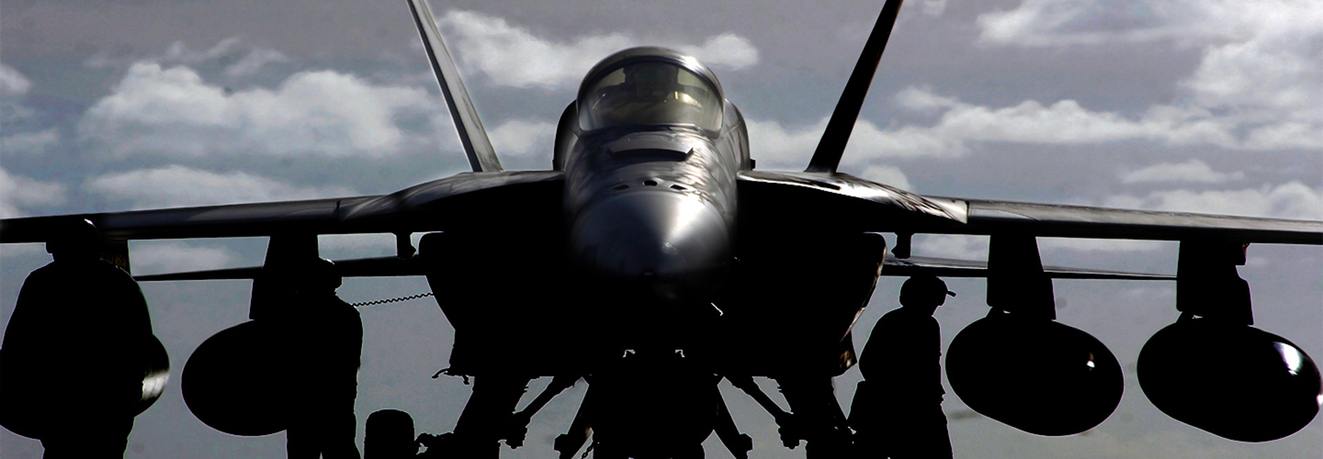 An F/A-18E Super Hornet assigned to the Eagles of Strike Fighter Squadron One Five (VFA-115) on the flight deck aboard USS Ronald Reagan (CVN 76), awaiting the next launch cycle.