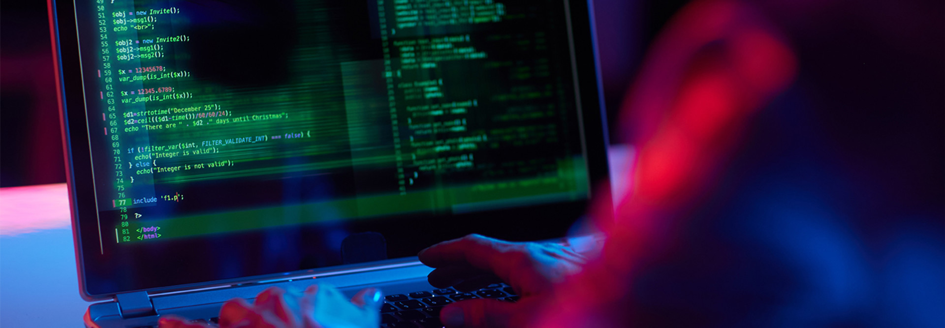 Person coding on computer