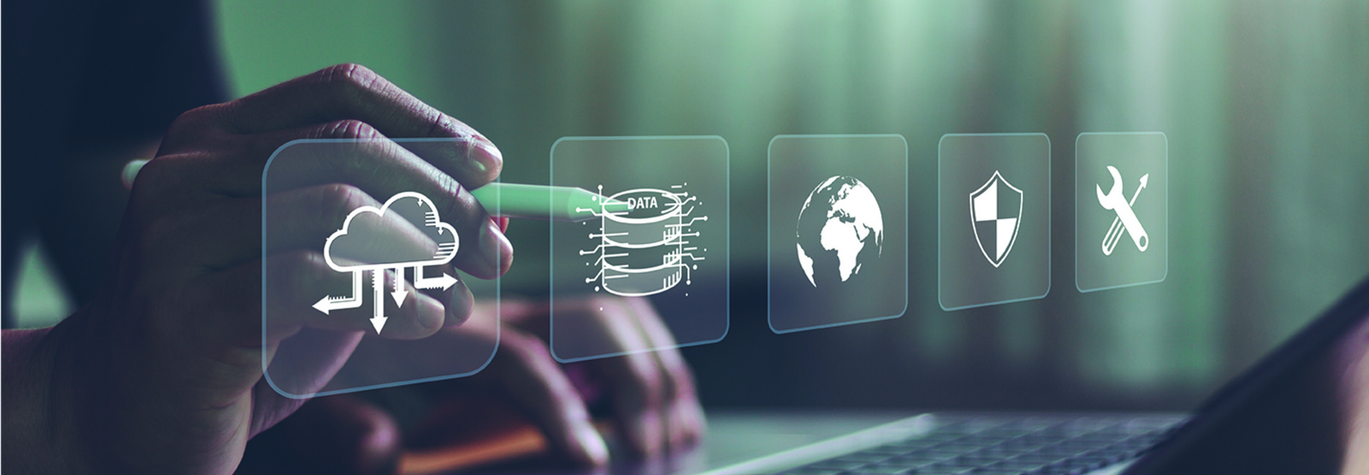 Person using a laptop with a disaster recovery icon on a virtual screen