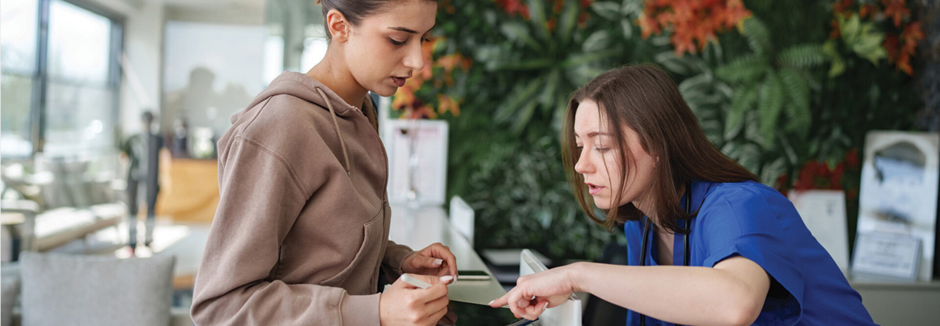 Person checking in at medical office