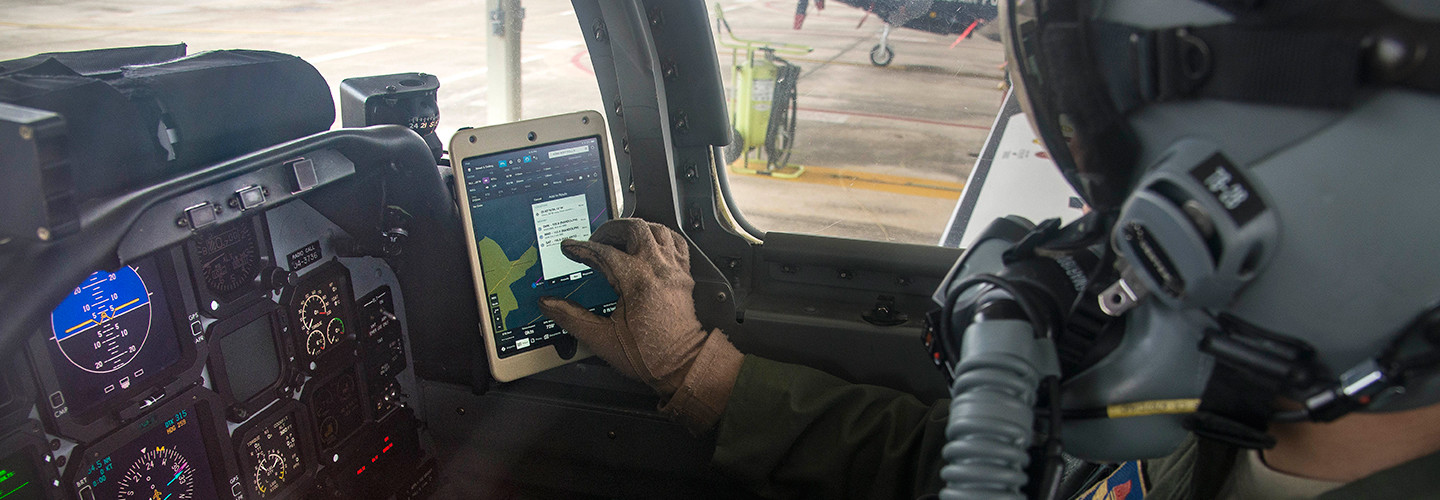 Maj. Earl Arnold, 12th Flying Training Wing electronic flight bag program manager, does preflight checks on a T-6 Texan using an electronic flight bag Feb. 13, 2018, at Joint Base San Antonio-Randolph.