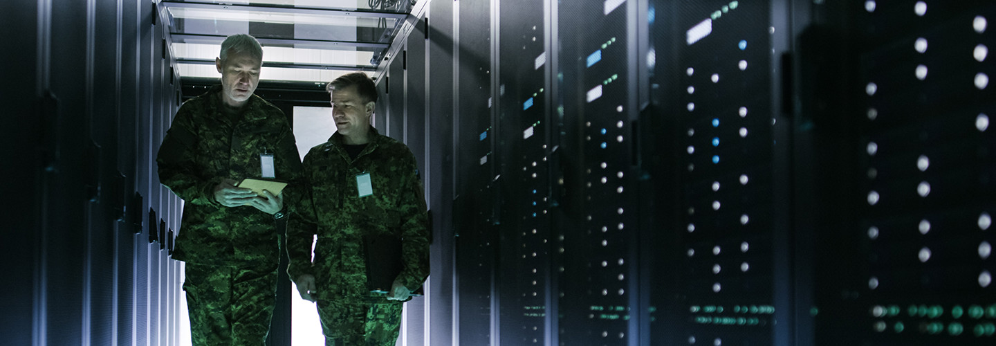 Army officers in a data center 