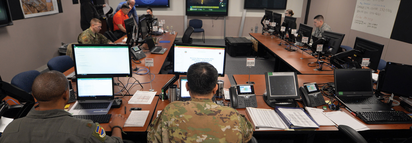 The 55th Wing’s Recovery Operations Center staff works 16-hour shifts disseminating information to the base populace regarding the flooding caused by the Missouri River on March 19, 2019. The river breached the levee system, which widened the river’s footprint, covering half the base. 