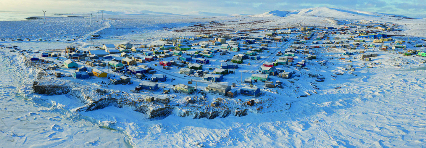 Aerial view of tiny Alaska village in the snow
