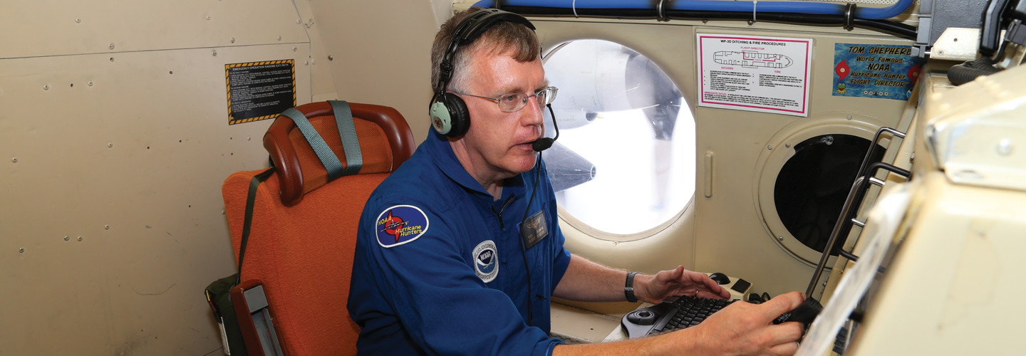 Flight director Rich Henning on N42RF speaking into headset