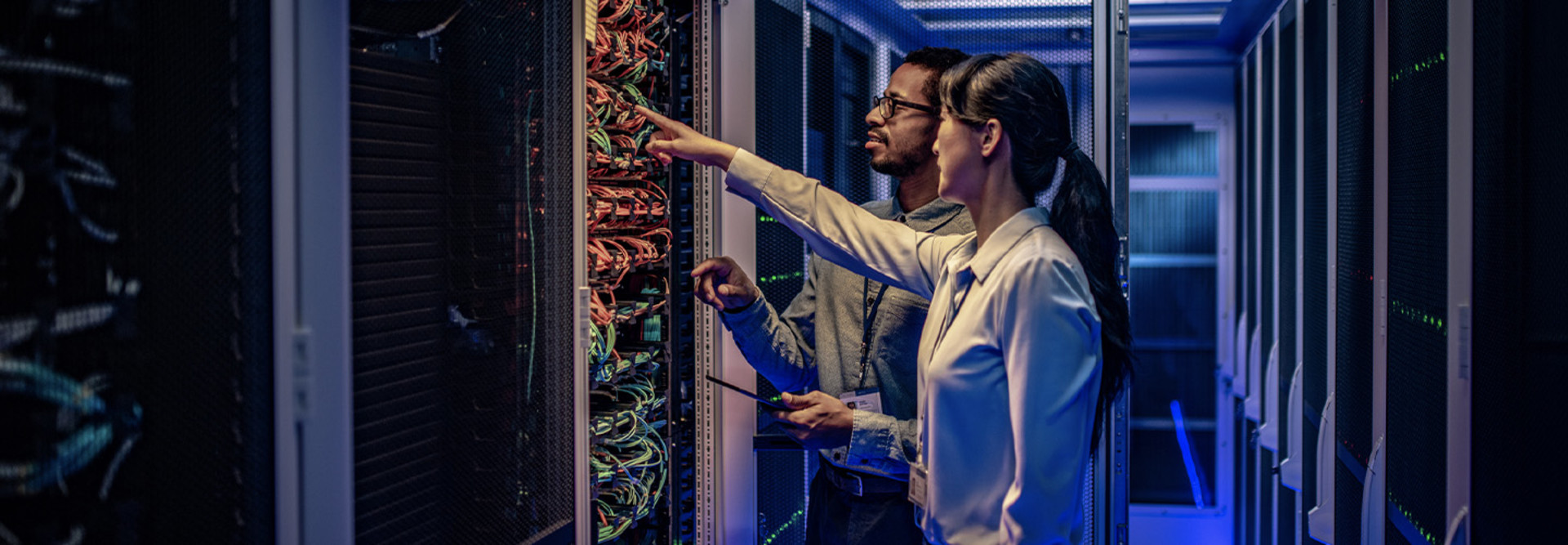 People assessing a data center