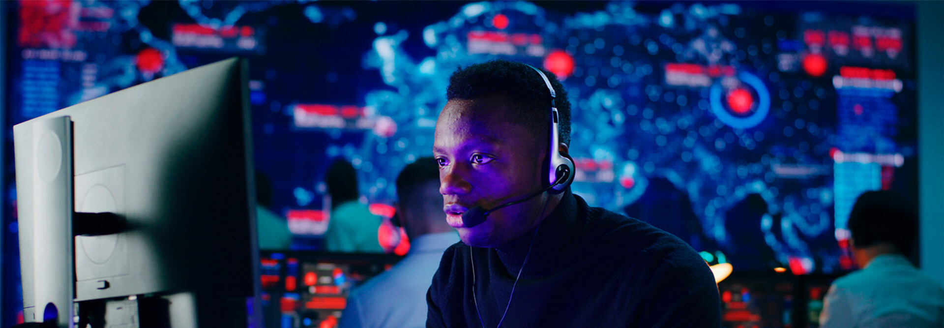 Person using headset at computer