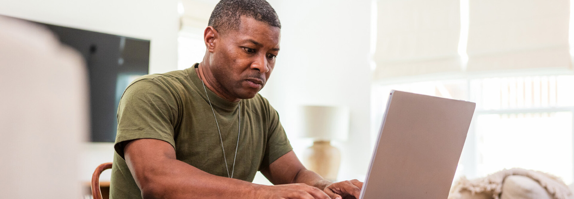 Person using computer at home