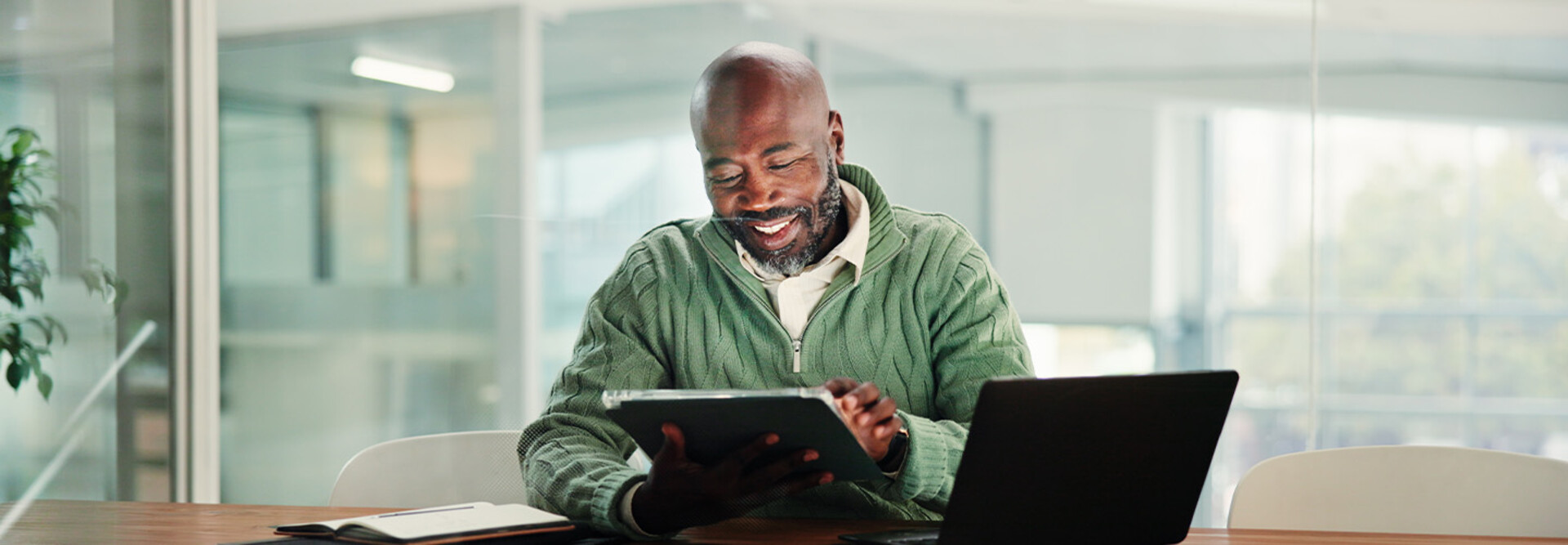 Person using tablet in the office