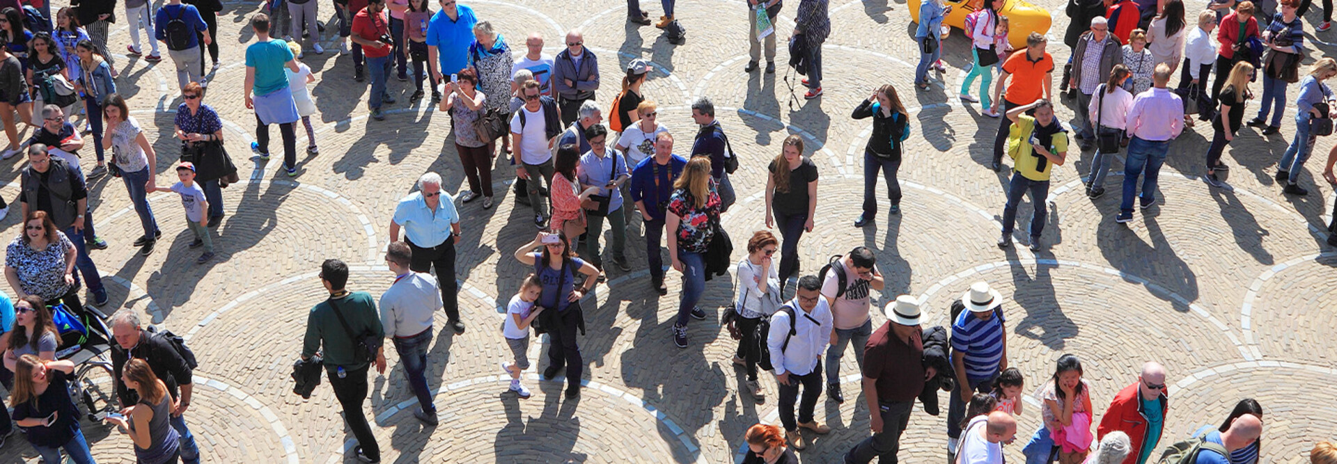 People walking through city