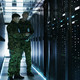 Army officers in a data center 
