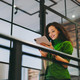 Person using mobile technology in office