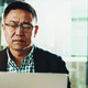 Man submitting information on a laptop