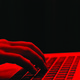 Red keyboard with hand