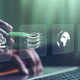 Person using a laptop with a disaster recovery icon on a virtual screen