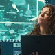 Person observing screens in SCIF