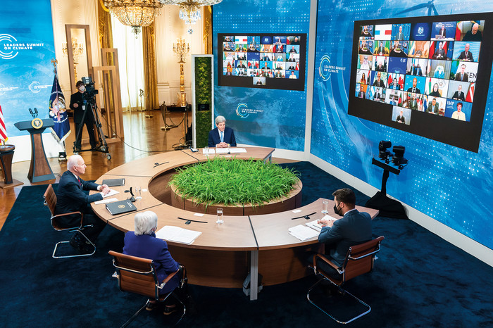 President Joe Biden and Cabinet members hold a Zoom meeting with world leaders at the White House in April.
