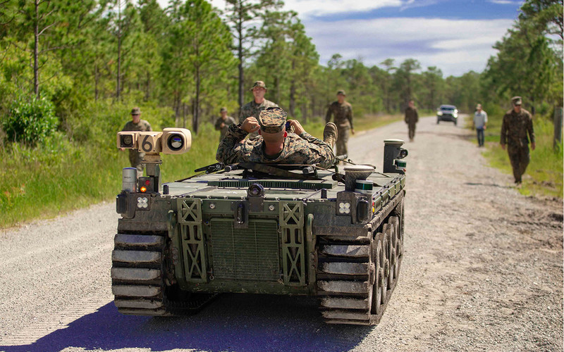 Marines rehearse medical evacuation scenarios with an Expeditionary Modular Autonomous Vehicle 