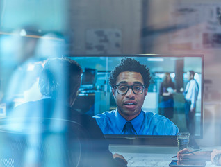 Office workers using a videoconferencing tool 