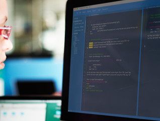 A woman programmer working on a cloud environment 