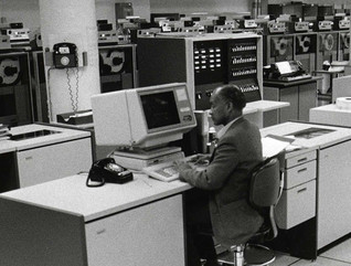 Census Bureau workers in the 1980s on cpmputers 