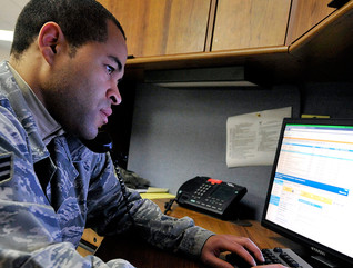 Senior Airman Jason McKenzie, client systems technician from the 436th Communications Squadron, troubleshoots a computer issue by remotely logging into a customer's computer Jan. 19, 2012, at Dover Air Force Base, Del. 