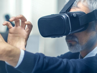 Federal worker manipulating a virtual object while wearing a VR headset 