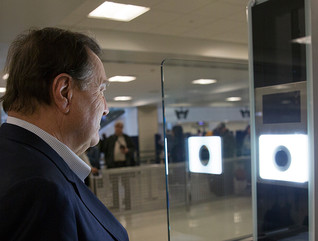 U.S. Customs and Border Protection officers screen international passengers arriving at the Dulles International Airport in Dulles, Va., November 29, 2016