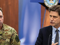 Defense Department CIO Dana Deasy, right, and Air Force Lt. Gen. Jack Shanahan, director of the Joint Artificial Intelligence Center, host a roundtable discussion on the enterprise cloud initiative with reporters at the Pentagon, Aug. 9, 2019. 