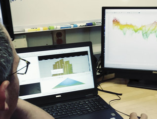 Dr. Erik Ebert works on the data provided by the multi-beam scan aboard the National Ocean and Atmospheric Administration Ship Nancy Foster, Aug. 24, 2018. The final product will be a detailed map of the wreck site. 