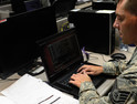 Tech. Sgt. Brad Davis, 119th Command and Control Squadron system administrator, participates in a class exercise in a Network War Bridge Course from the 39th Information Operations Squadron, Hurlburt Field, Fla., Sept. 19, 2014. 