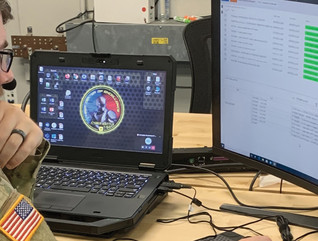 Spc. James Hyman, 915th CWB, completes an event-driven cyberspace incident scenario from the perspective of an intelligence analyst using the Cyber SU software application. 