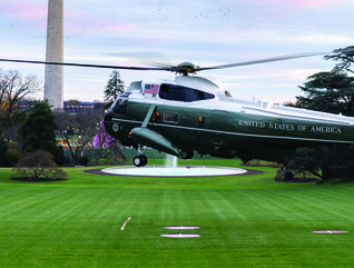 president's helicopter taking off from the white house lawn