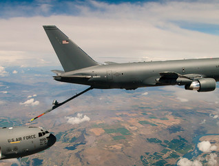 A KC-46 Pegasus refueling tanker conducts receiver compatibility tests with a C-17 Globemaster III from Joint Base Lewis-McChord. 