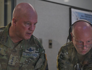 U.S. Space Force Gen. John W. "Jay" Raymond, left, Chief of Space Operations, speaks with Brig. Gen. Stephen Purdy, Space Launch Delta 45 commander, at Cape Canaveral Space Force Station, Fla., May 17, 2021. 