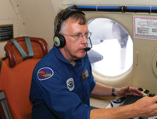Flight director Rich Henning on N42RF speaking into headset