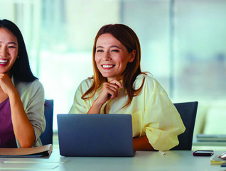 Three people in a business meeting