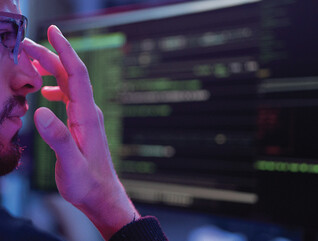 Programmer analyzing code