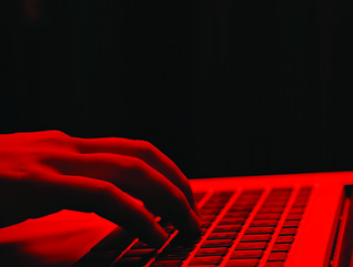 Red keyboard with hand
