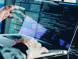man working on a laptop