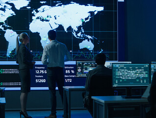 People looking at digital map