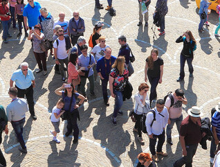People walking through city