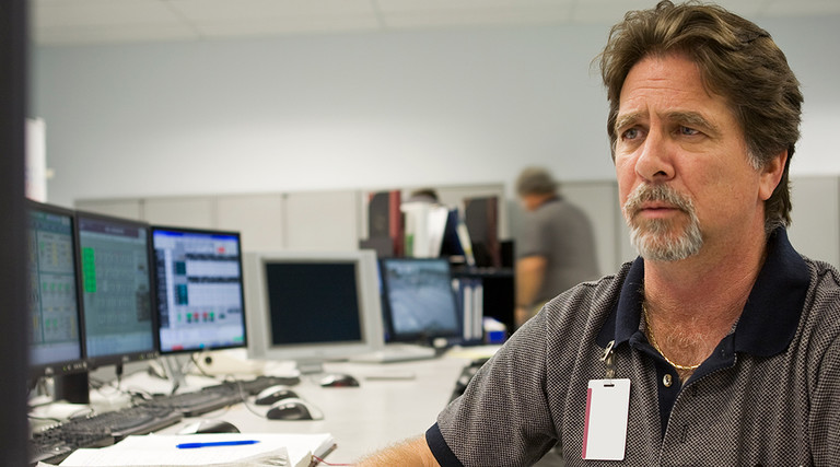 IoT Security engineer in a control room 