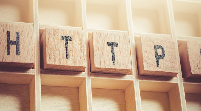 HTTPS spelled out in blocks on a shelf 
