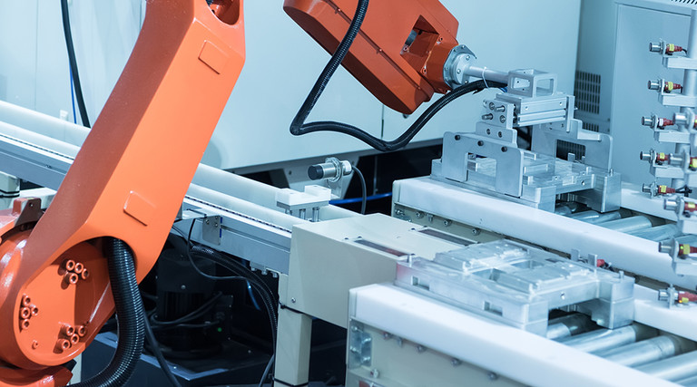 technology supply chain assembly line, smart robot assembling something 